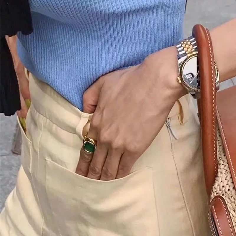 French elegant ring with green stone